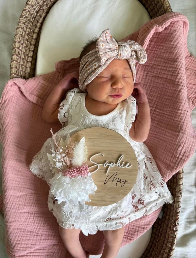 Wooden dried flower baby name plaque white with a touch of pink