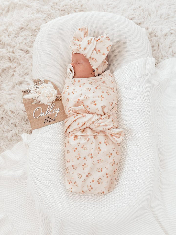 White and neutral dried flower birth announcement sign