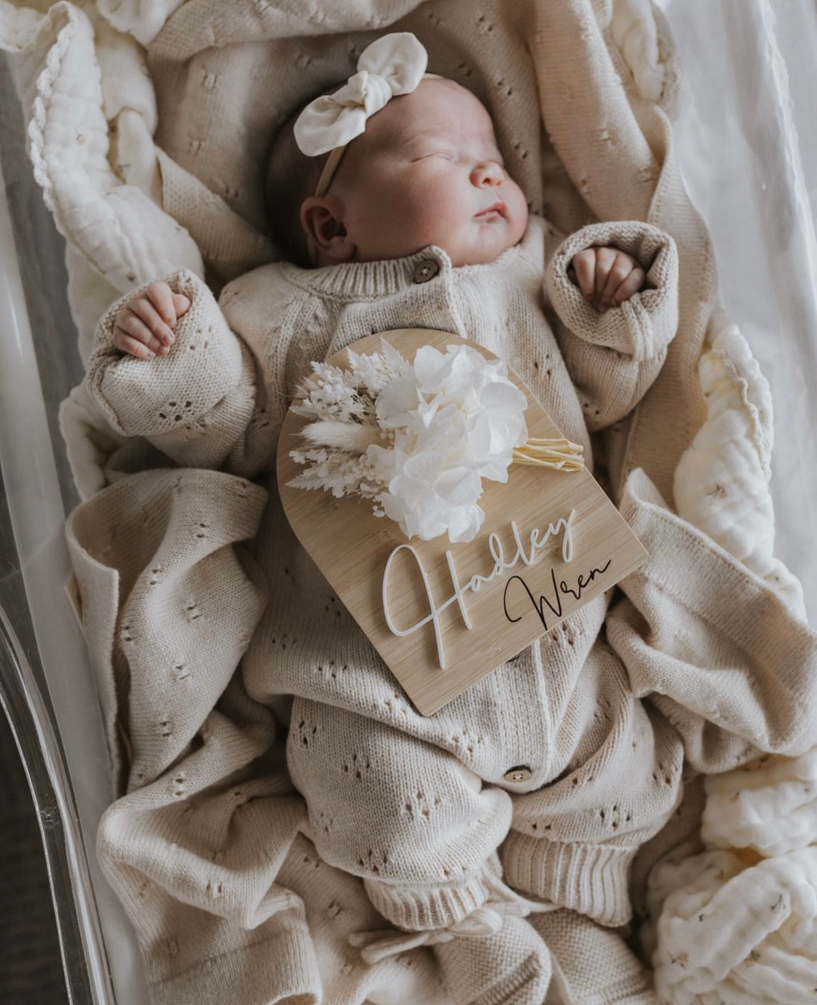 White and neutral dried flower birth announcement sign