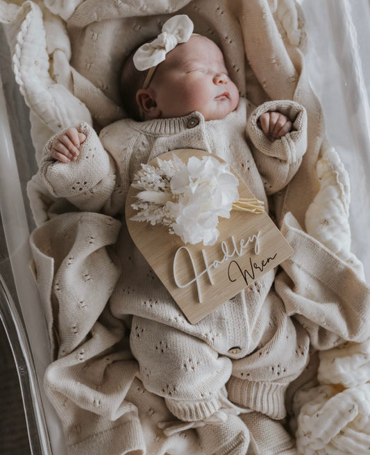 White and neutral dried flower birth announcement sign