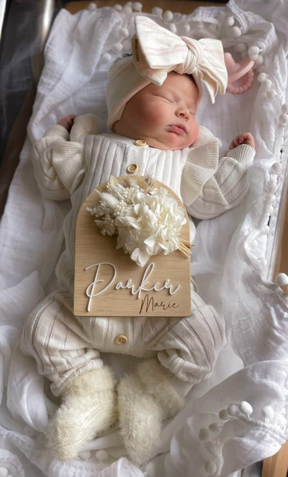 White and neutral dried flower birth announcement sign