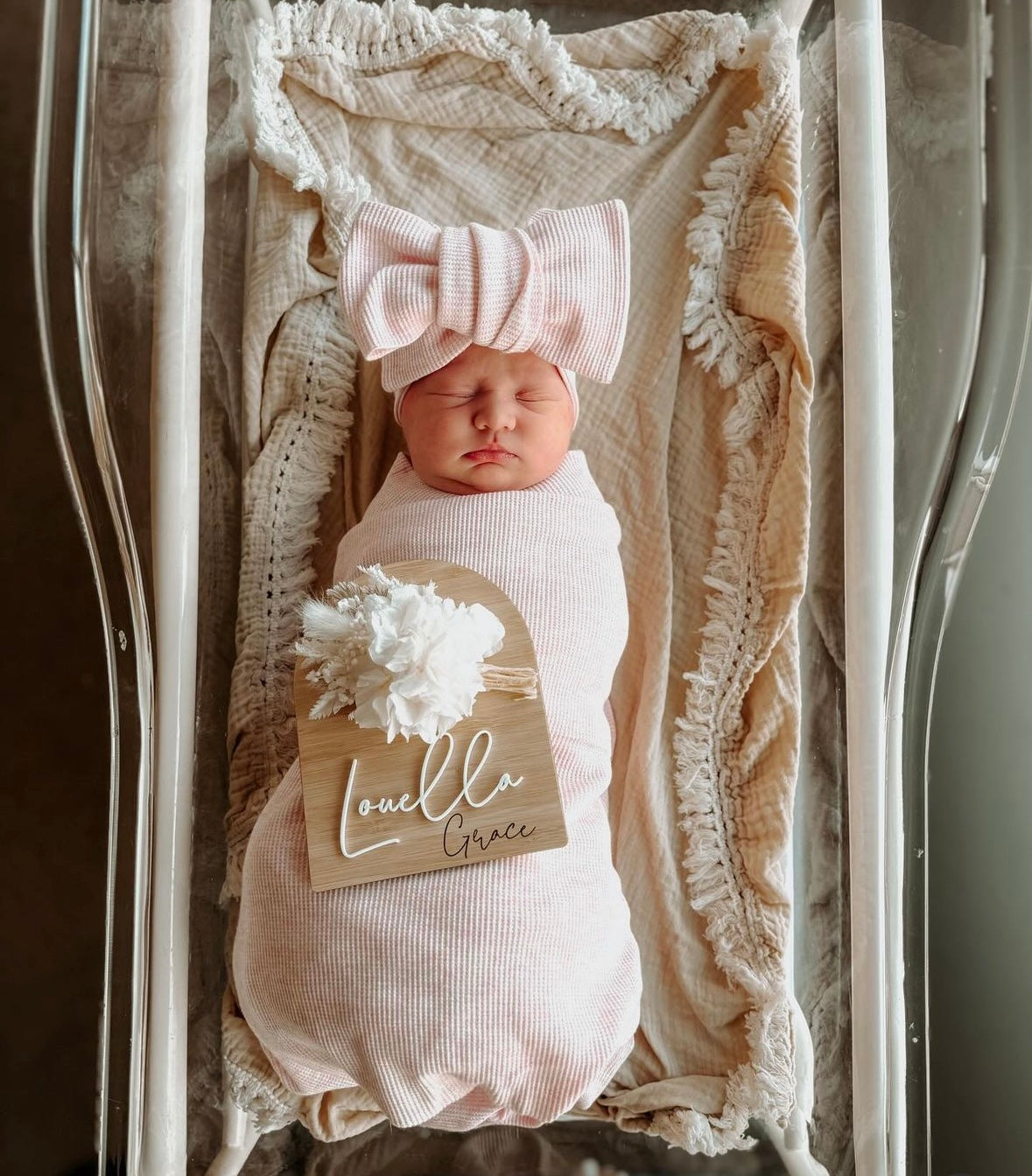 White and neutral dried flower birth announcement sign