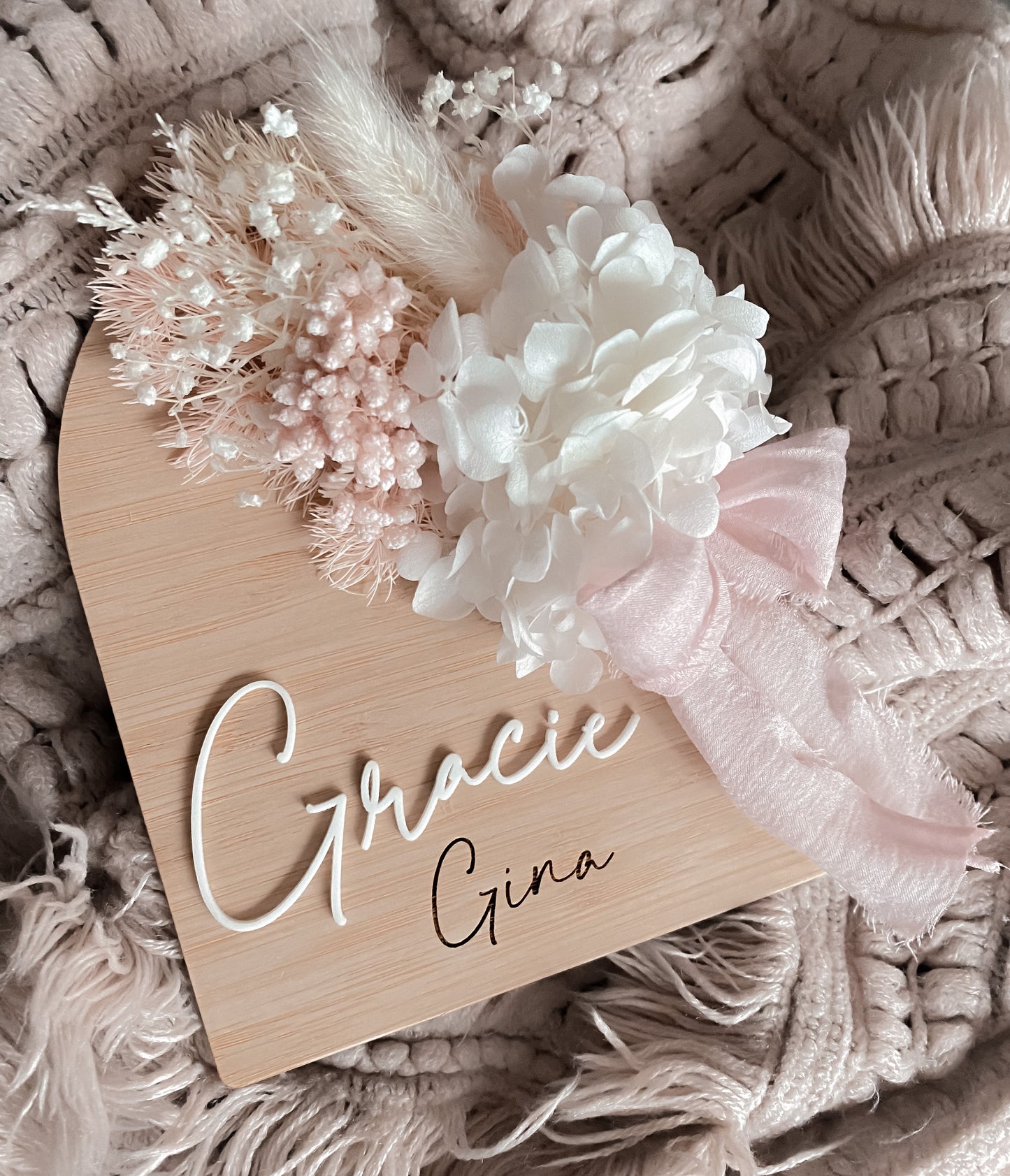 Wooden arch dried flower announcement sign with ribbon