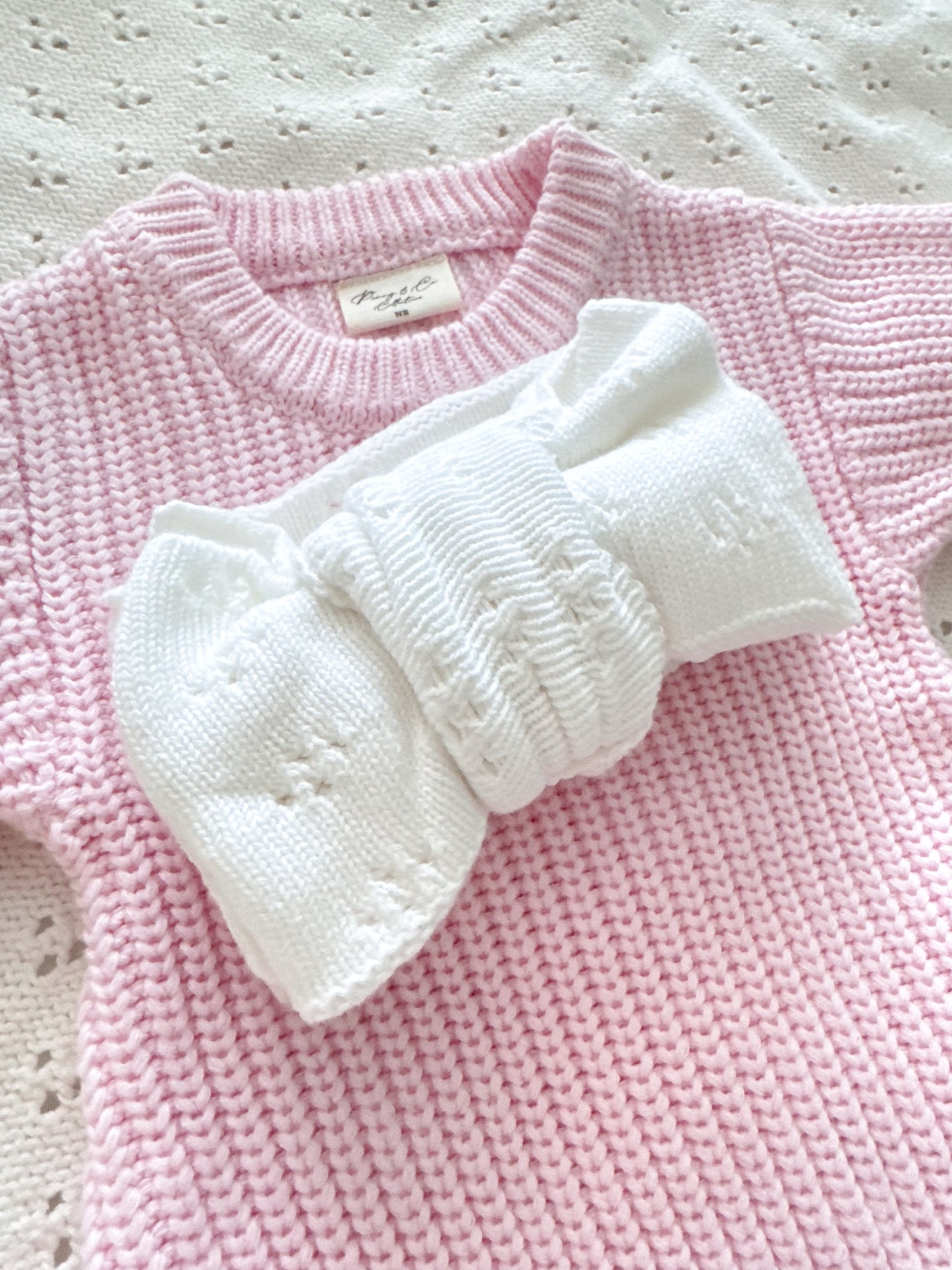 White pointelle pattern baby bow