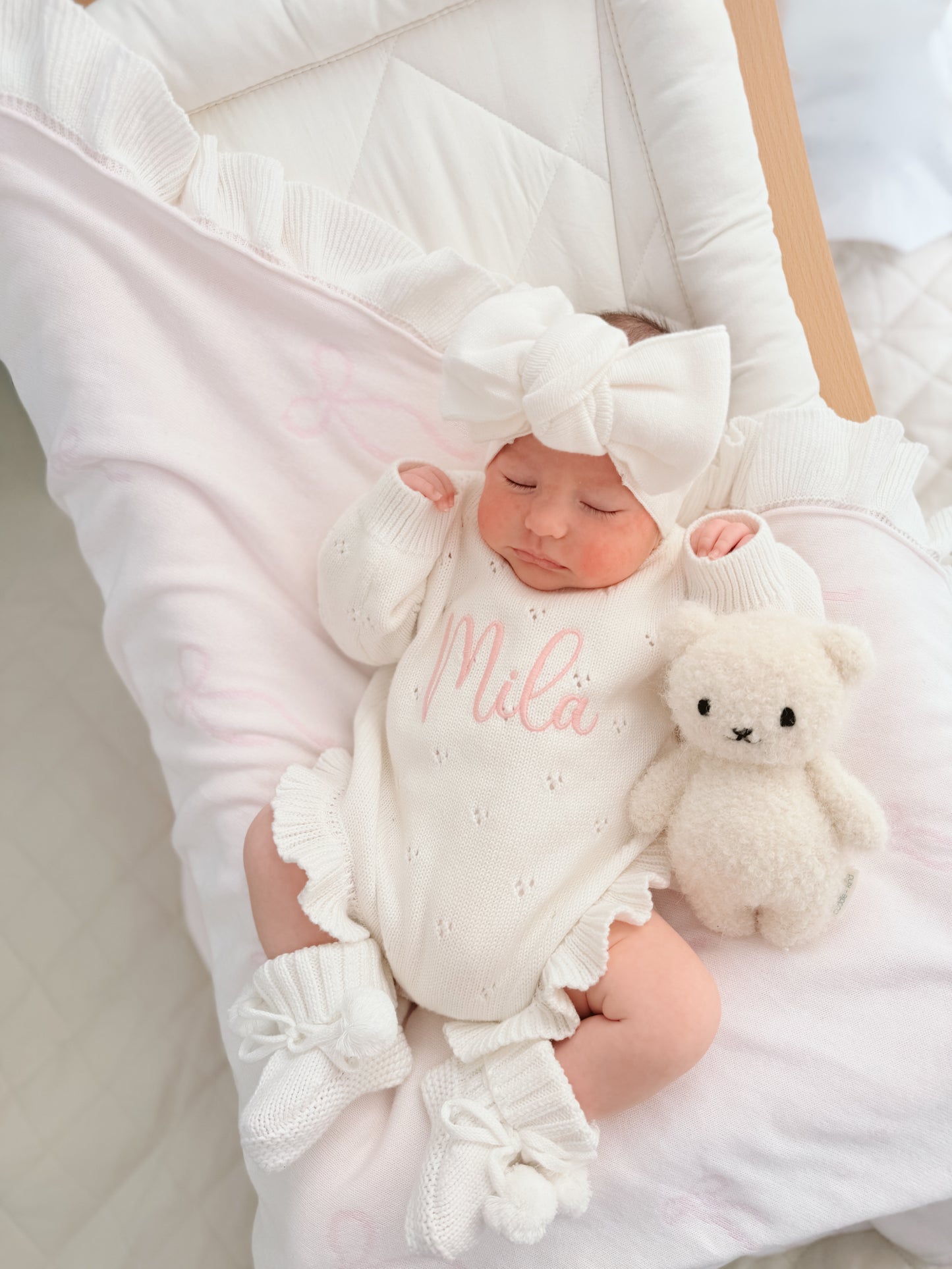 White pointelle frill baby announcement romper
