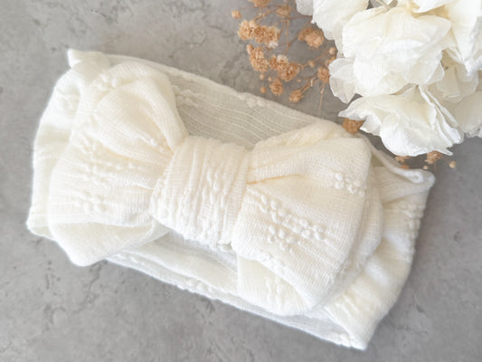 Floral pattern cream baby bow