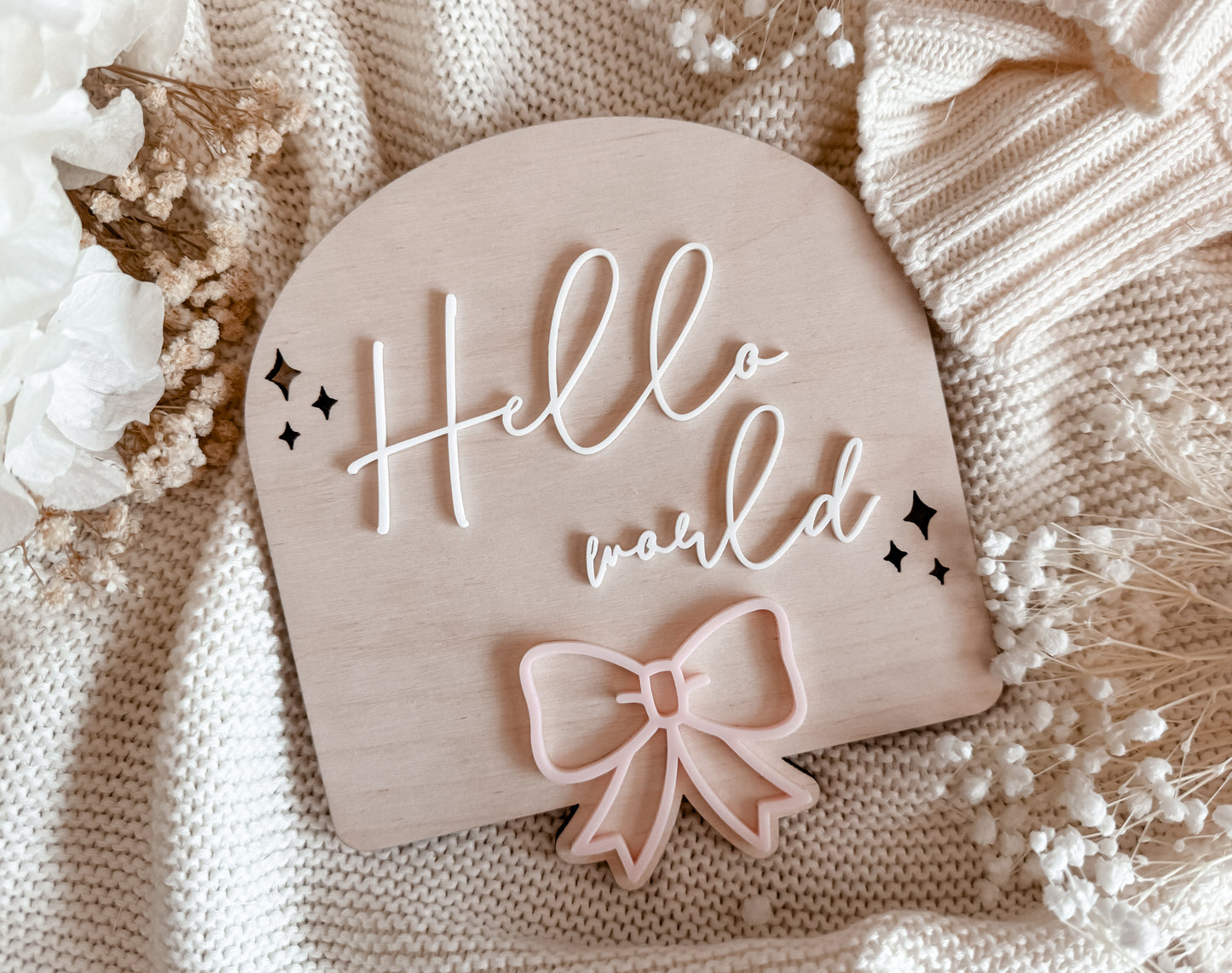 Baby girl birth announcement sign with bow