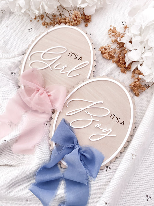 It’s a boy it’s a girl gender reveal signs with ribbon