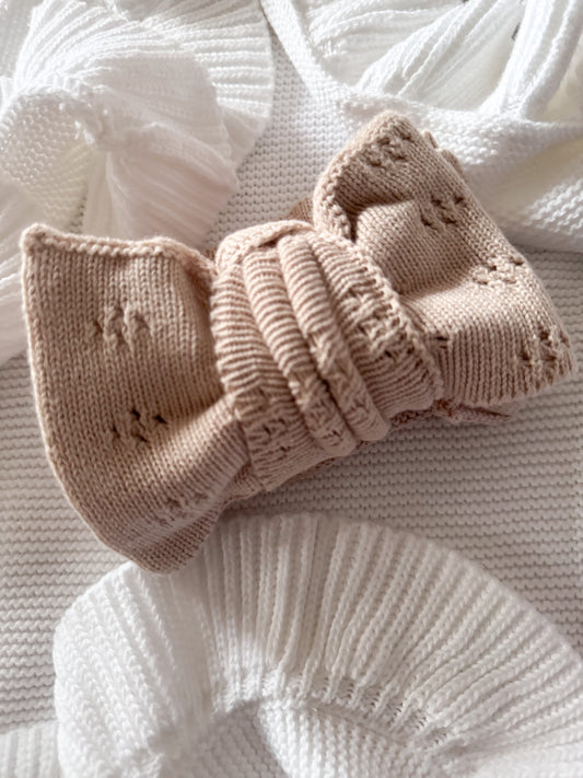 Beige pointelle pattern oversized baby bow