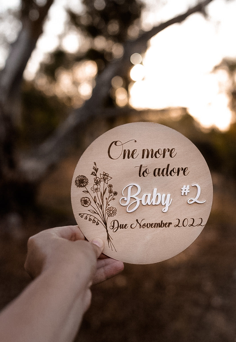 Wooden engraved pregnancy announcement sign