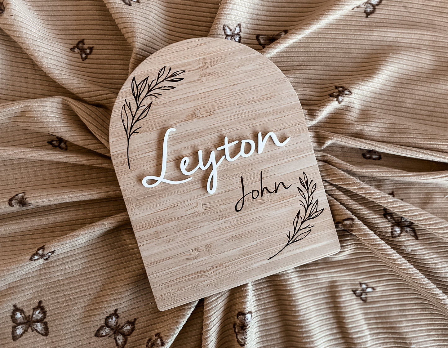 Arch birth announcement leaf pattern