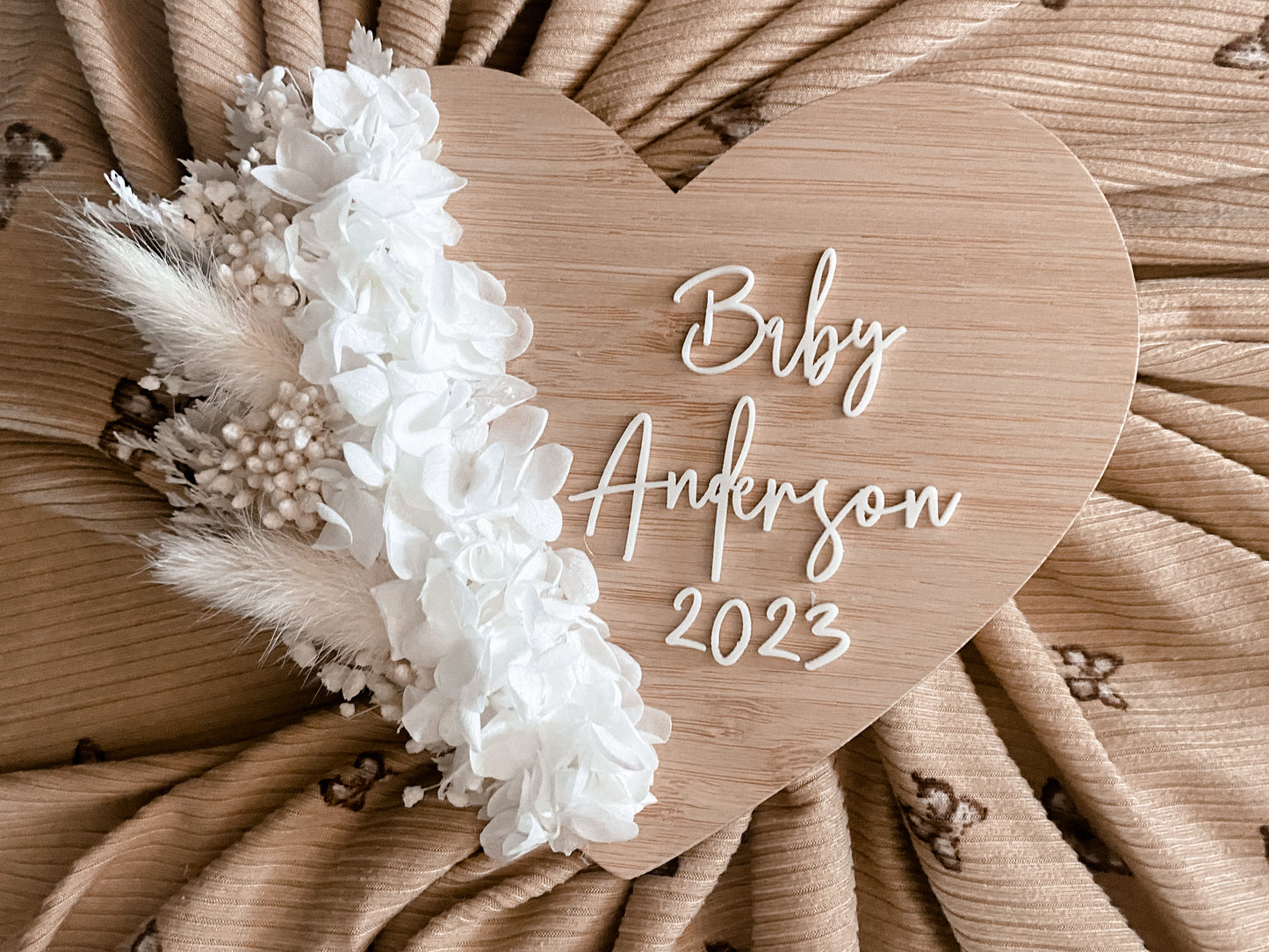 Baby “surname” heart shaped dried floral pregnancy announcement