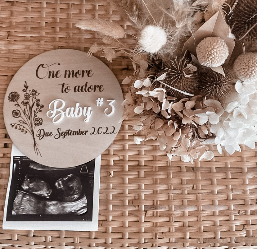 Wooden engraved pregnancy announcement sign