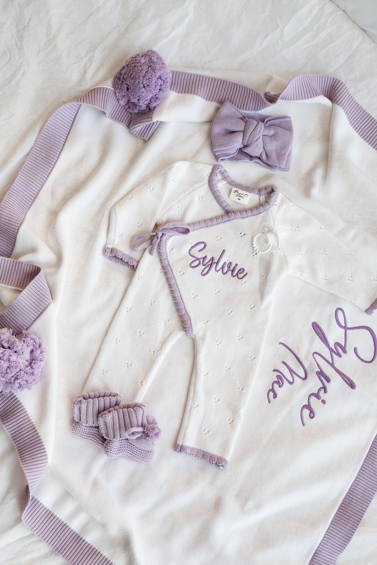 Personalised white and purple scallop trim baby announcement kimono