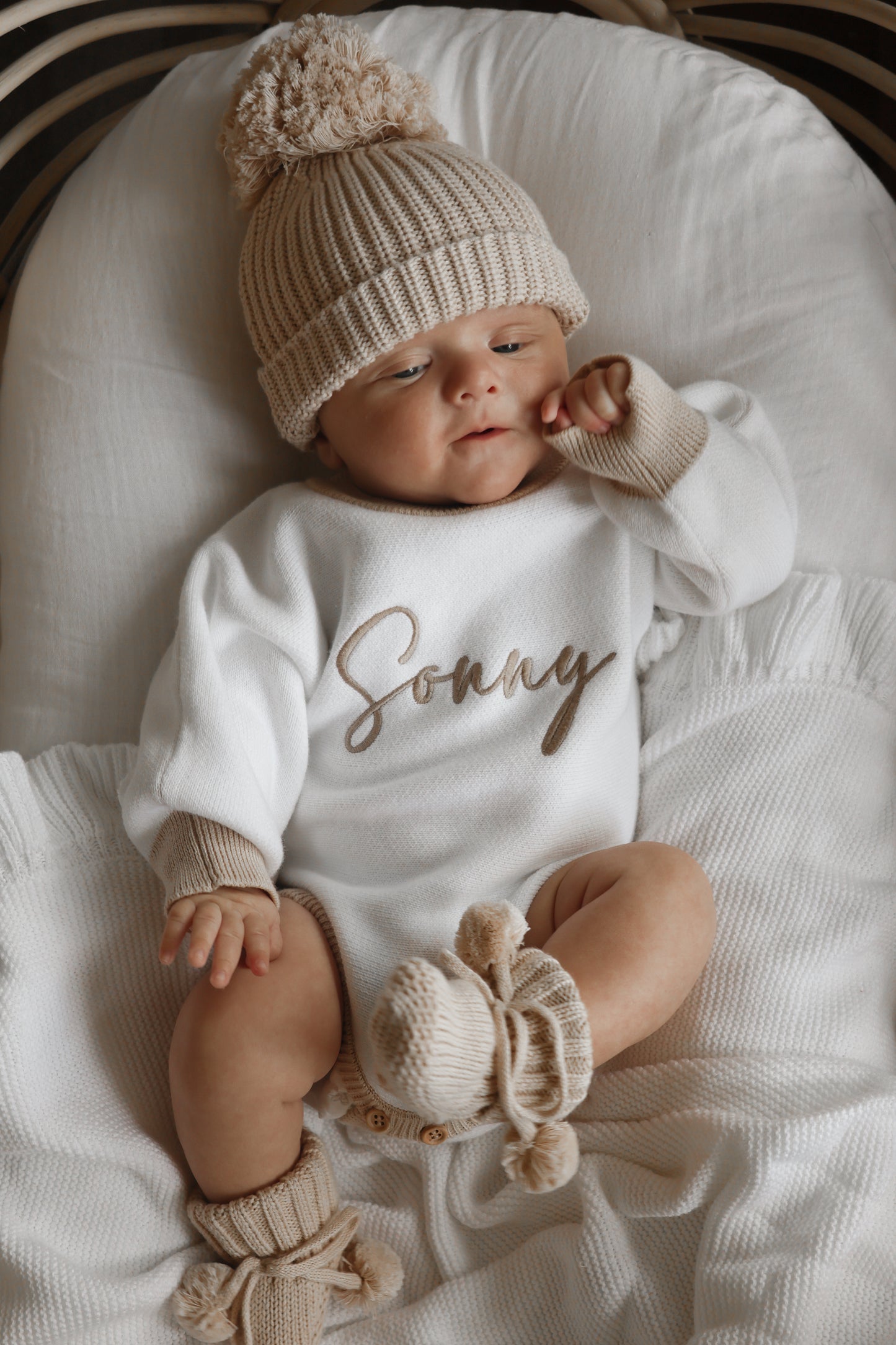 White and beige personalised baby romper
