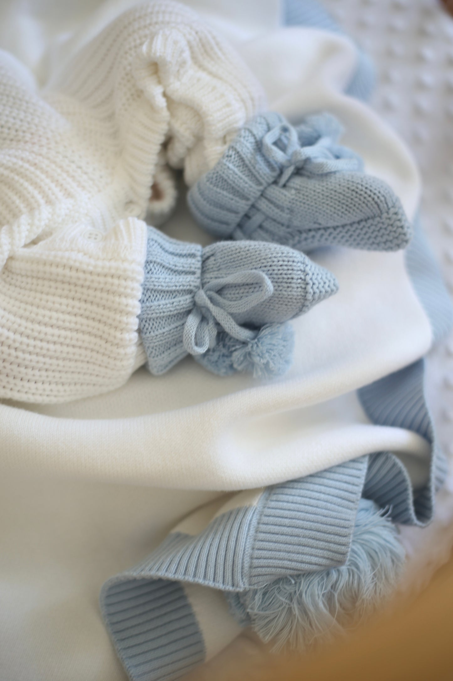 Blue knit baby pompom booties