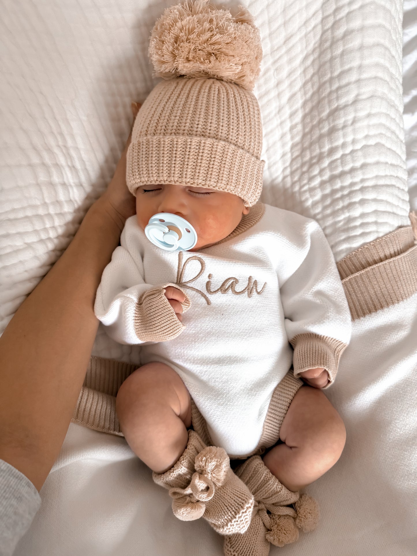 White and beige personalised baby romper