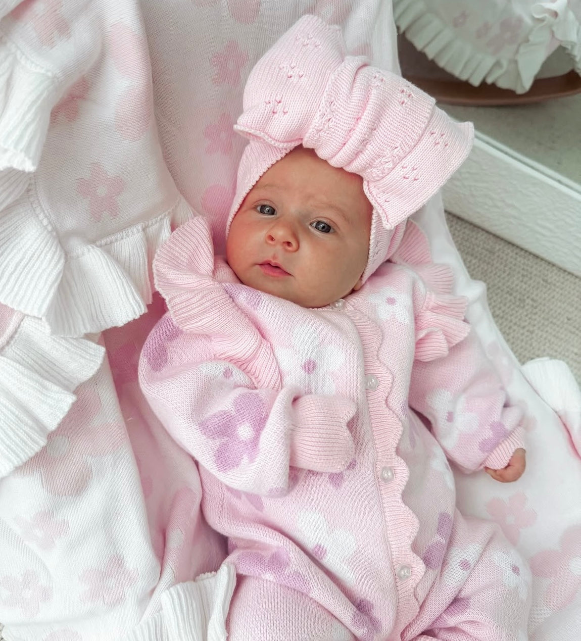 Pink and purple flower pattern baby romper