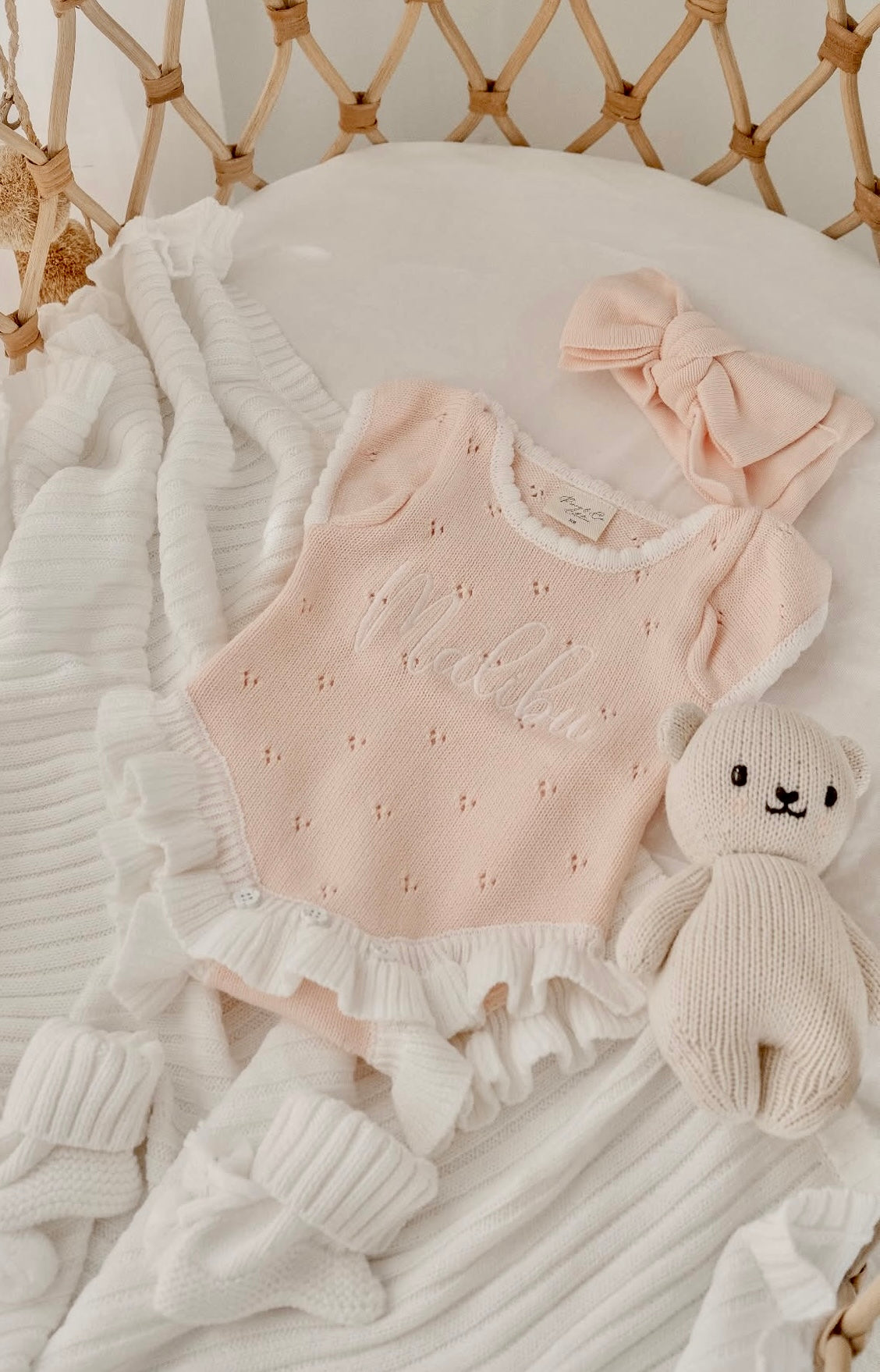 Pink frill pointelle baby girl announcement romper