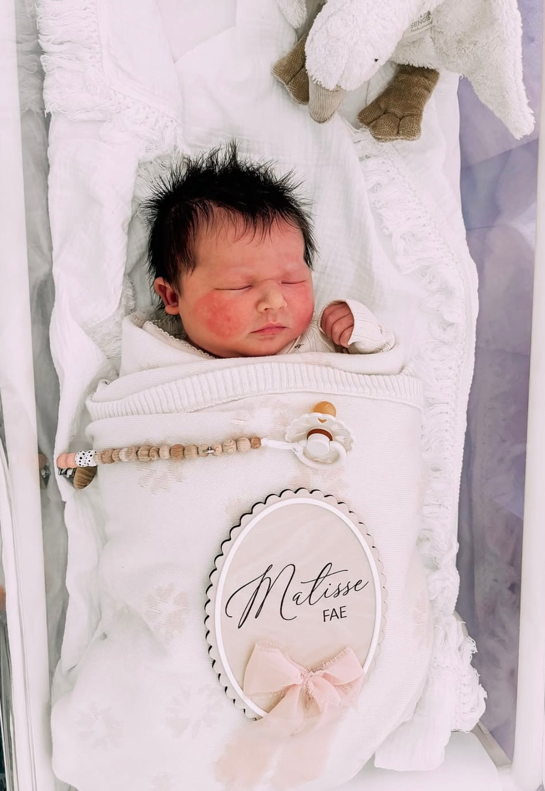 Scallop edge birth announcement sign with ribbon
