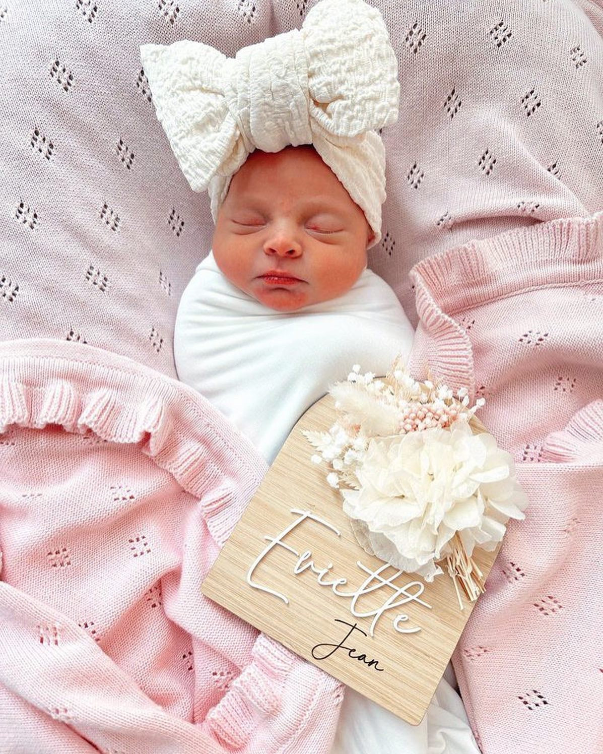 Wooden dried flower baby name plaque white with a touch of pink