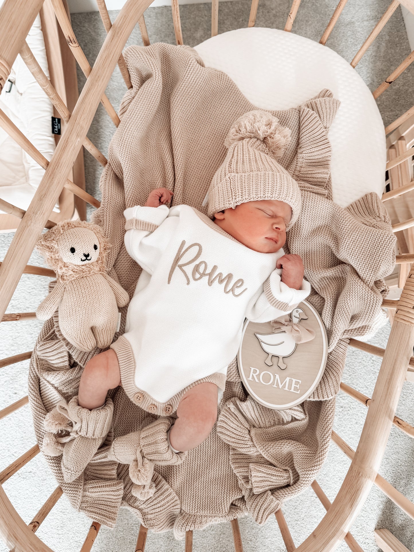White and beige personalised baby romper