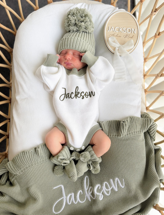 Green trim personalised baby romper