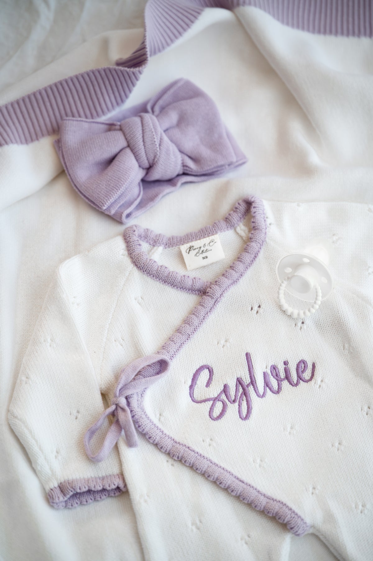 Personalised white and purple scallop trim baby announcement kimono