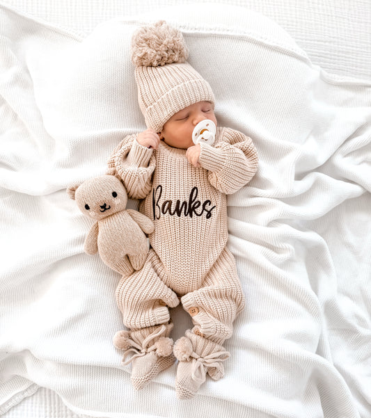 Neutral chunky knit baby announcement romper