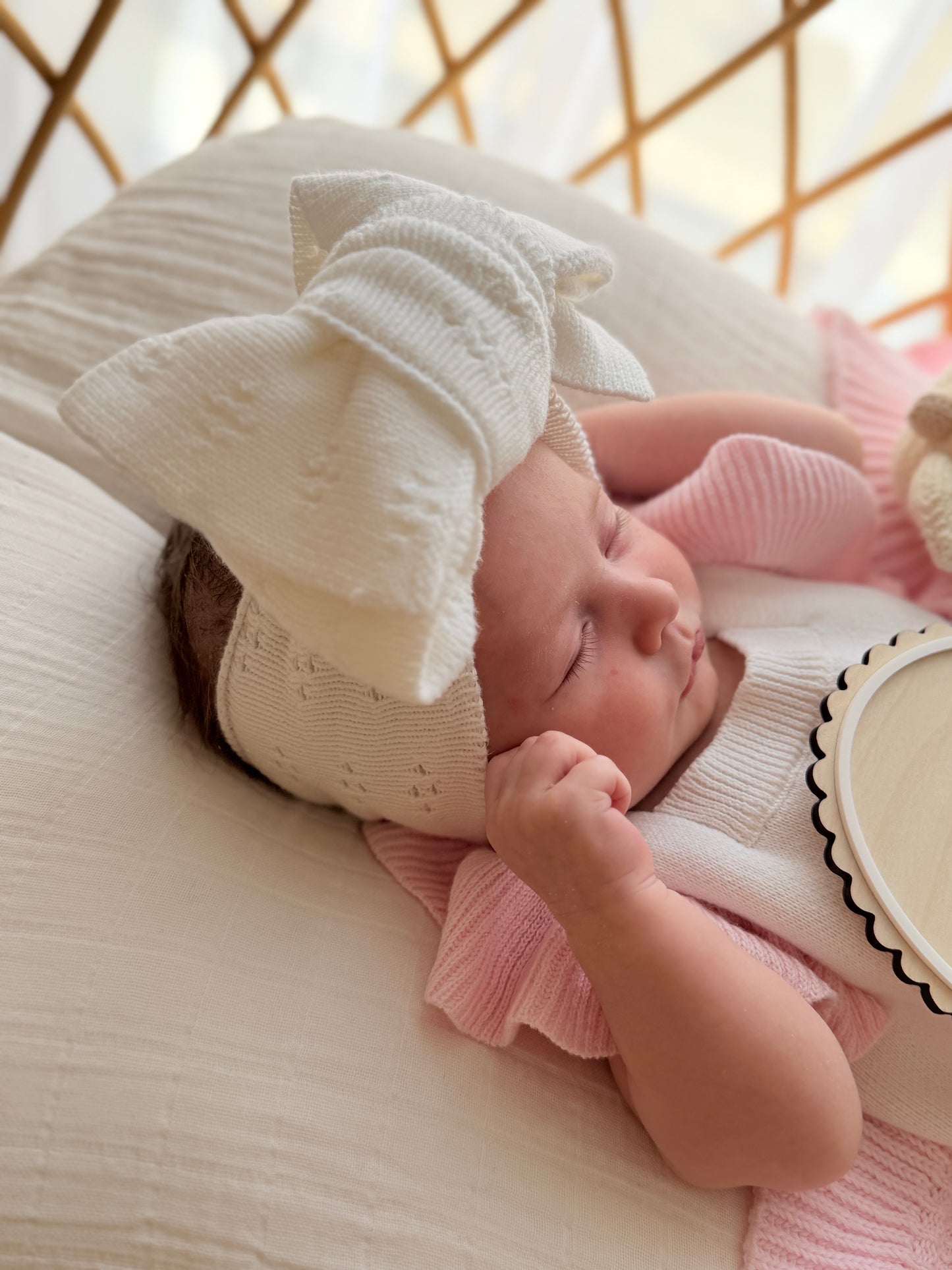 White pointelle pattern baby bow