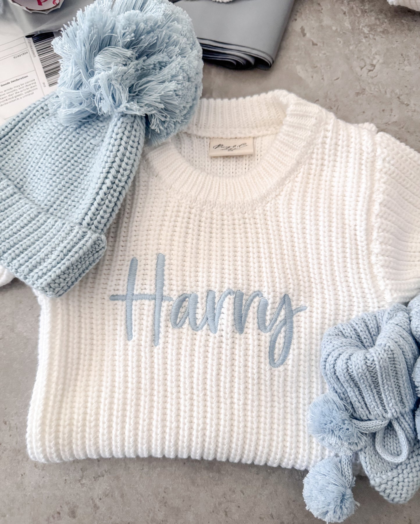 White chunky knit personalised announcement romper