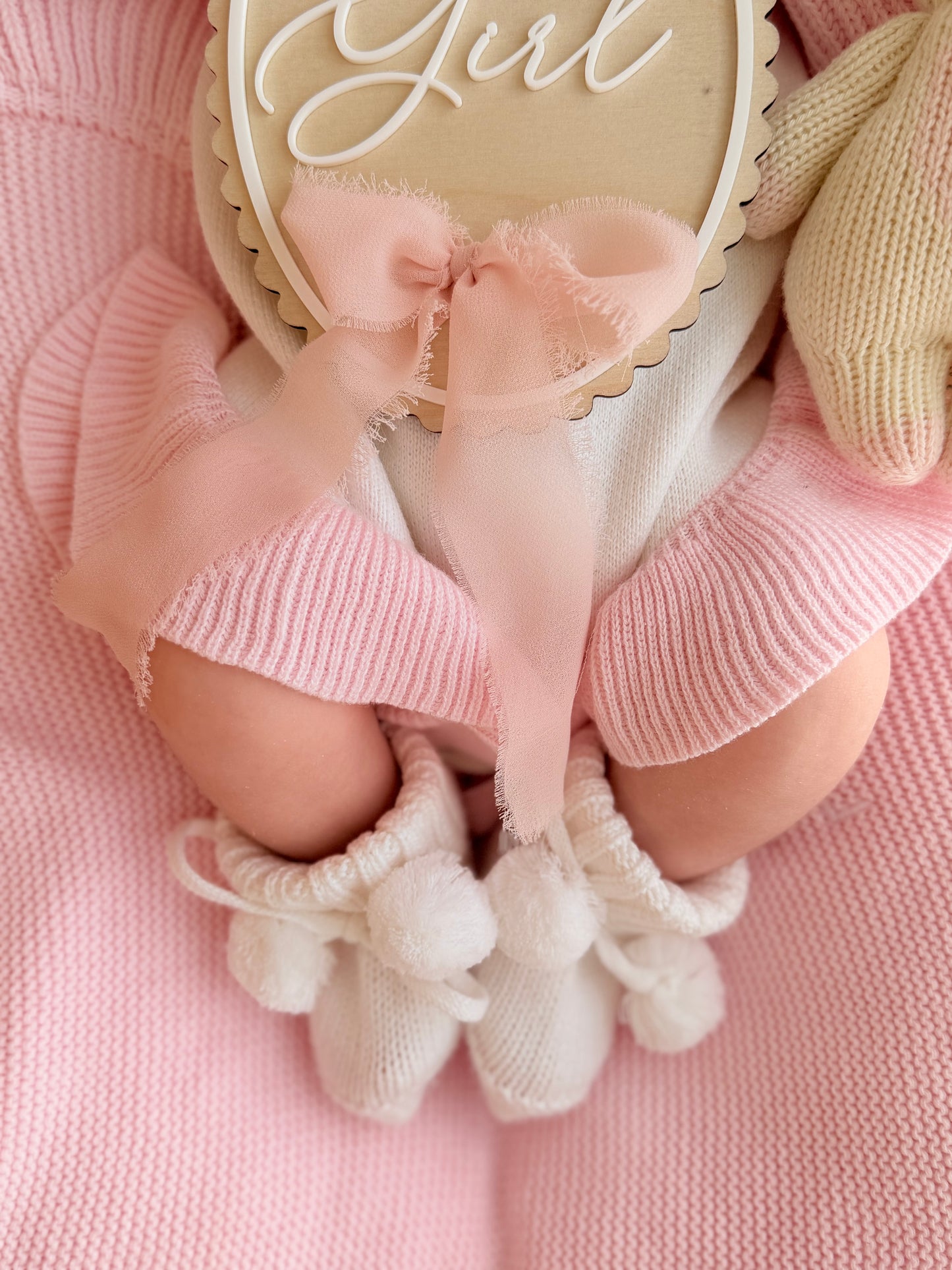 White soft knit pompom baby booties