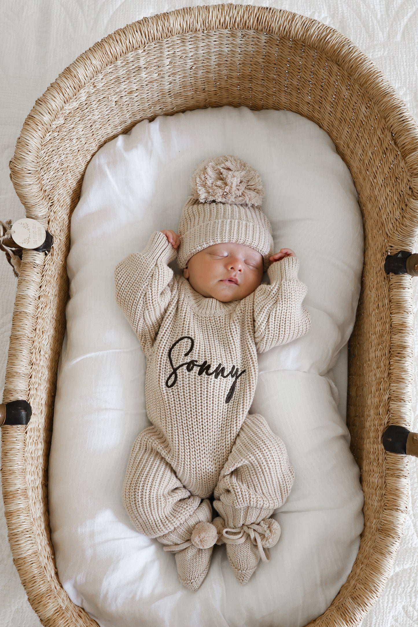 Neutral chunky knit baby announcement romper