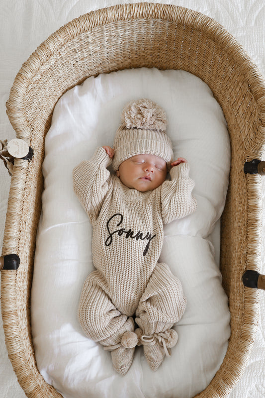 Neutral chunky knit baby announcement romper