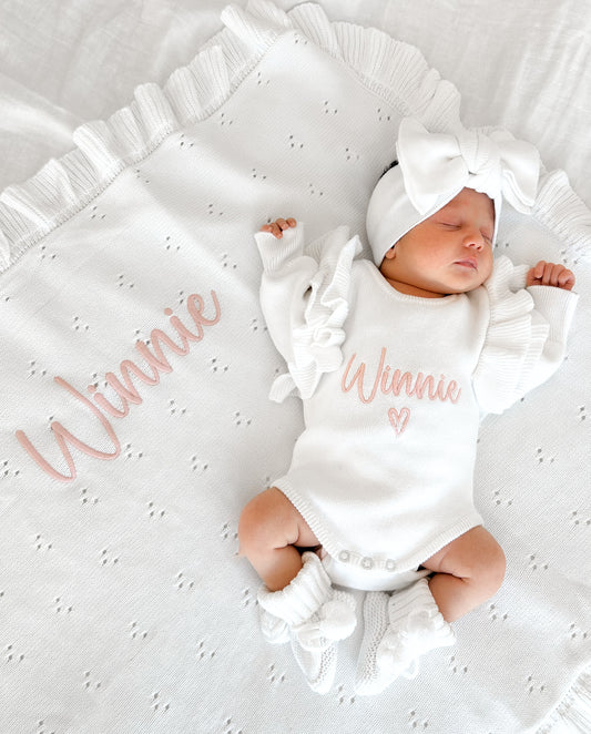 White frill heart baby name announcement romper