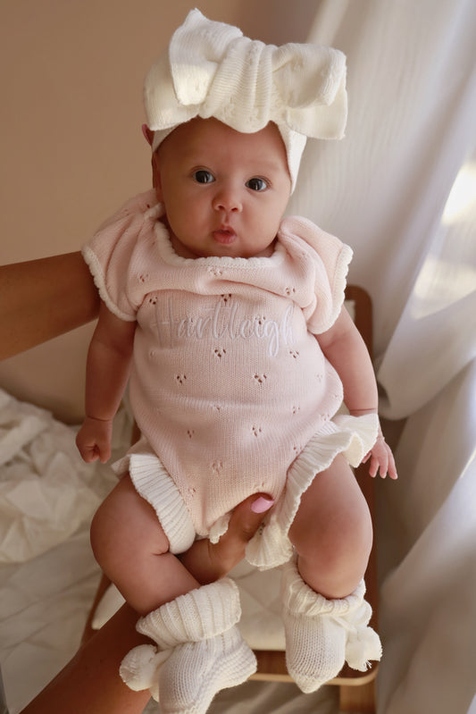 Pink frill pointelle baby girl announcement romper