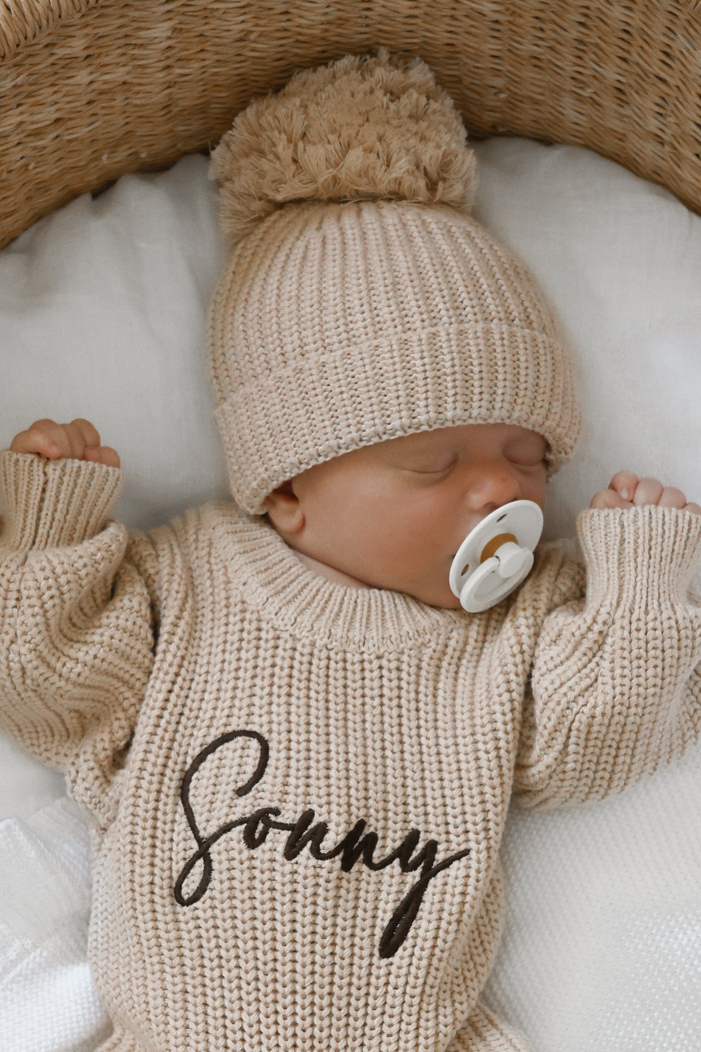 Neutral chunky knit baby announcement romper