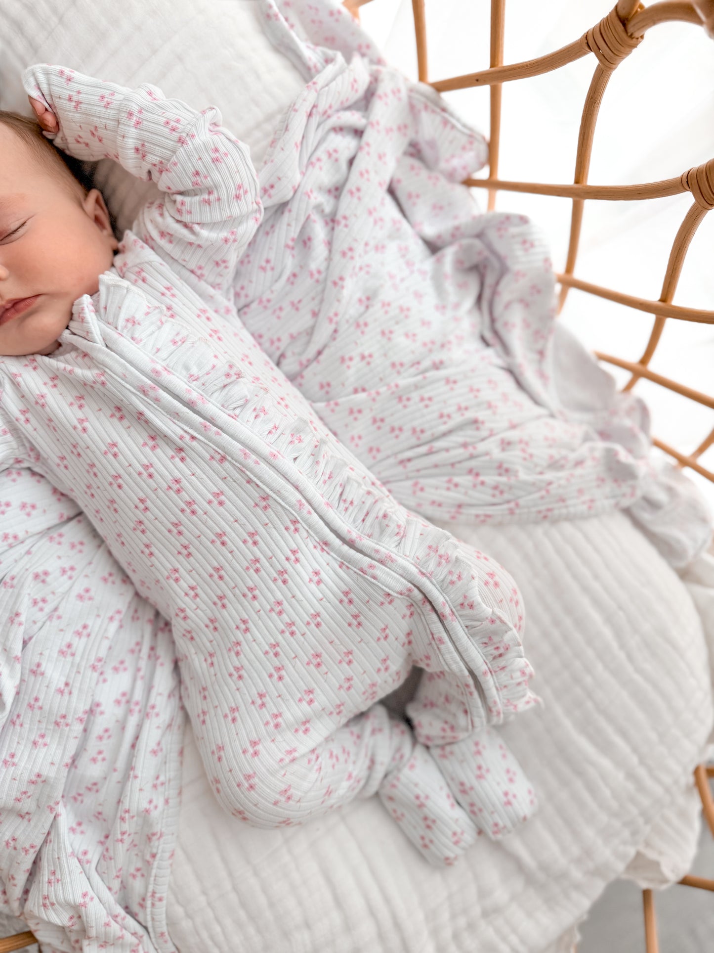Peyton pink flower zip frill onesie