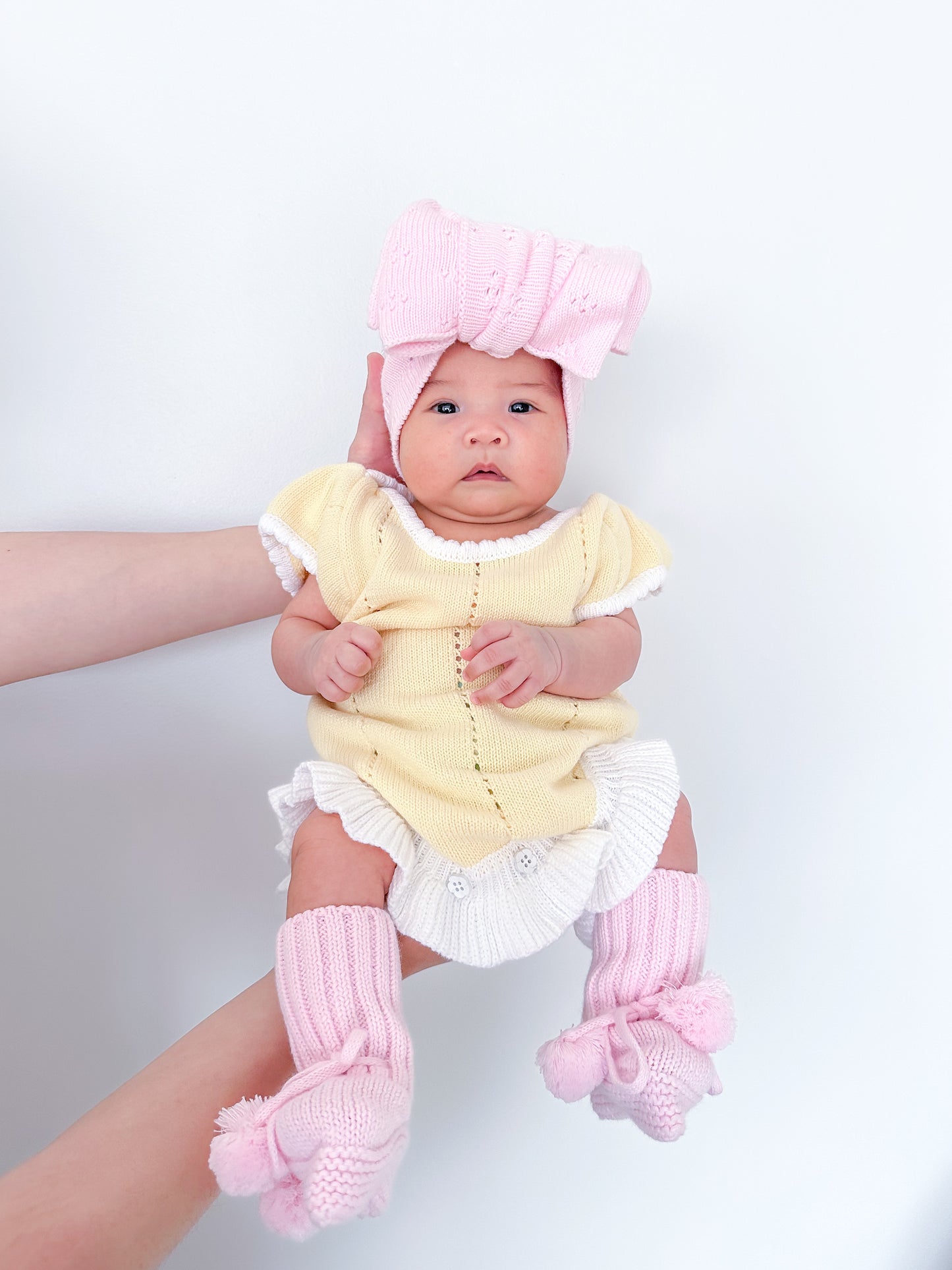 Yellow and white frill leg baby announcement outfit