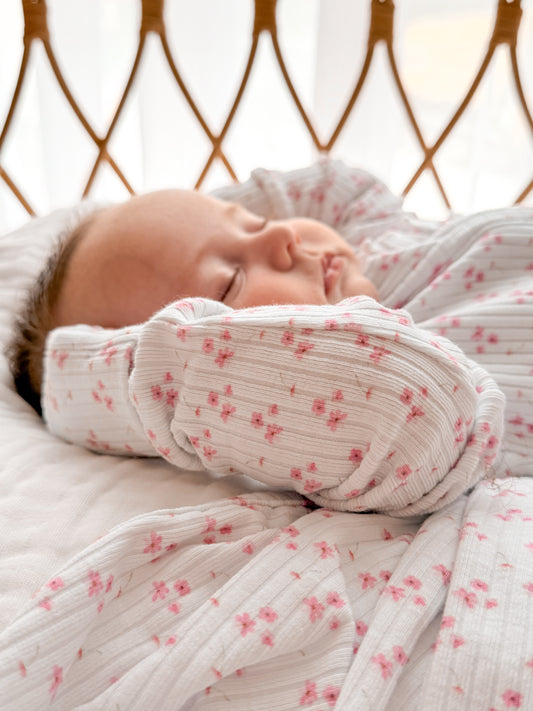 Peyton pink flower zip frill onesie