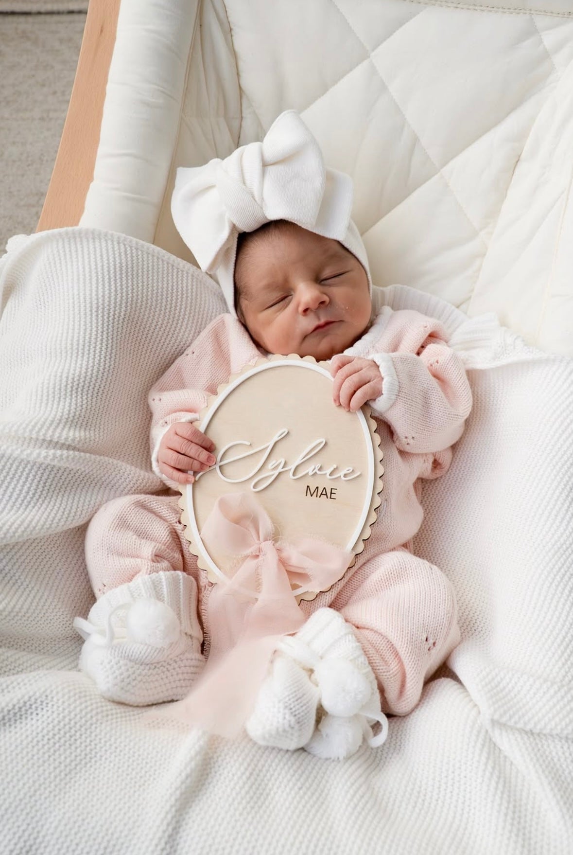 Scallop edge birth announcement sign with ribbon