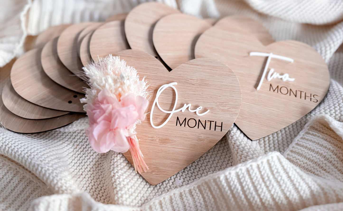 Dried flower heart shaped milestone signs