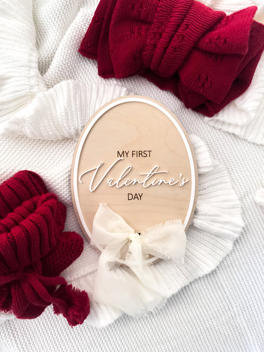 First Valentine’s Day oval ribbon sign