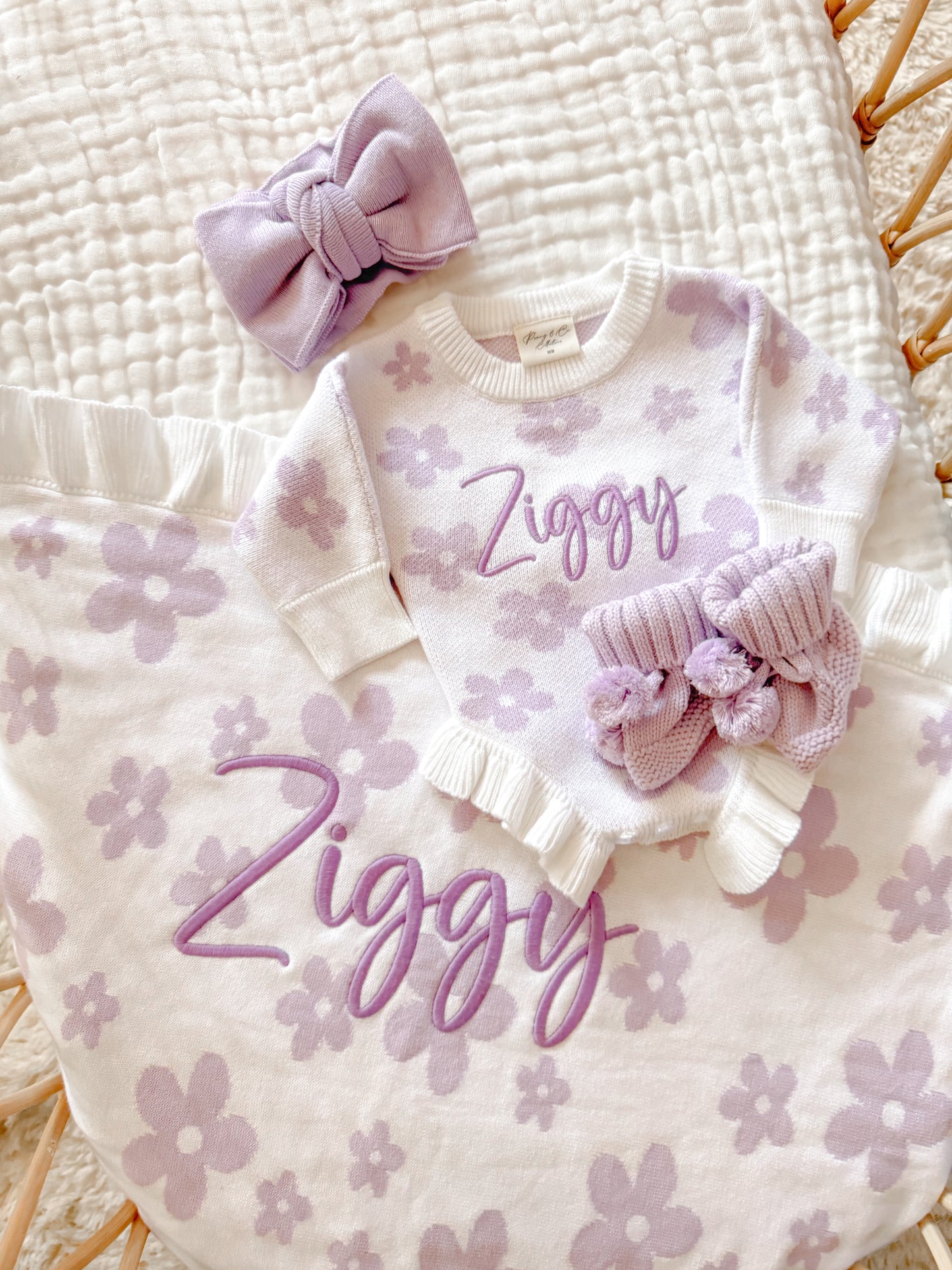 Reversible purple and white flower blanket