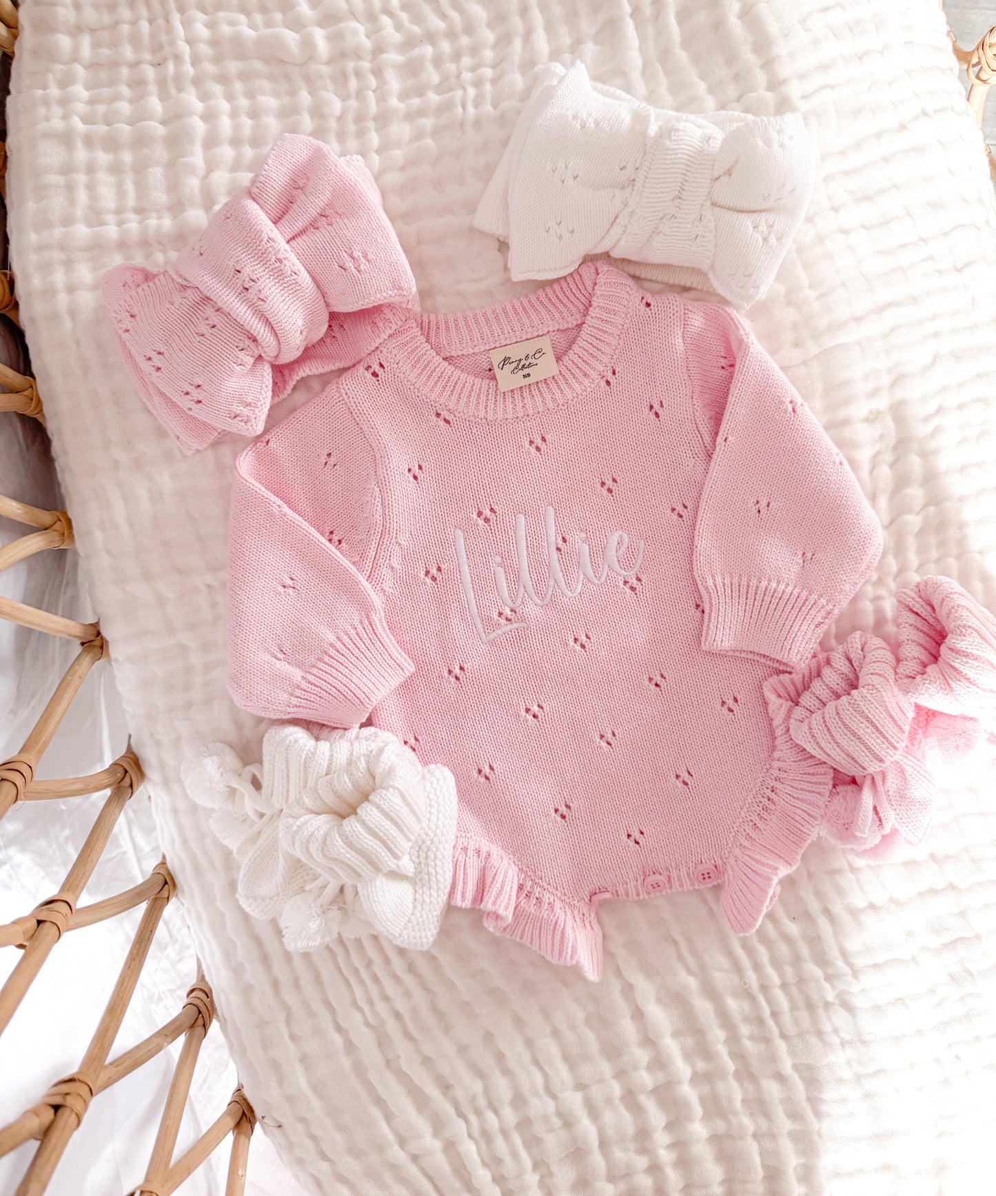 Pink pointelle frill baby announcement romper