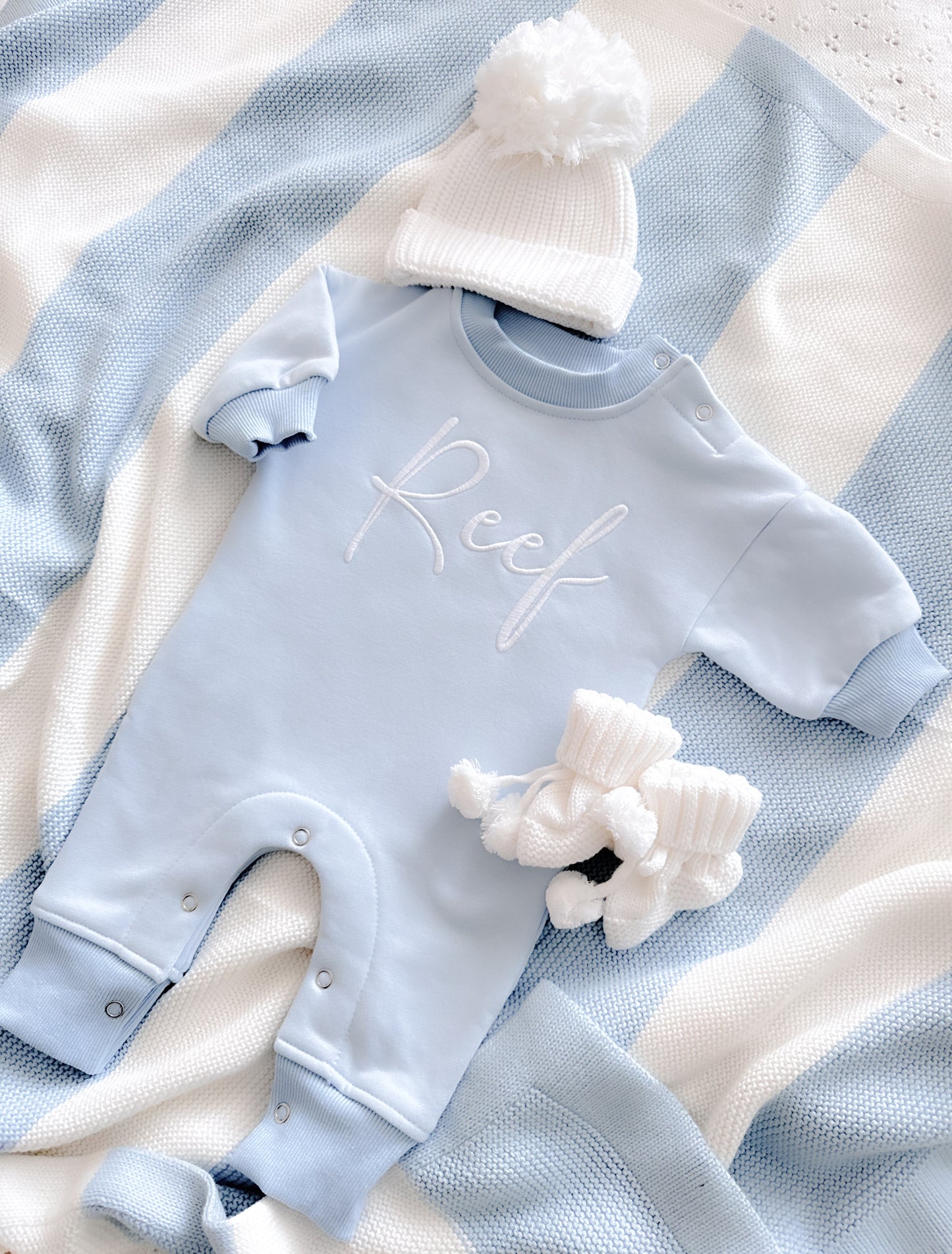 Baby blue fleece lined announcement romper