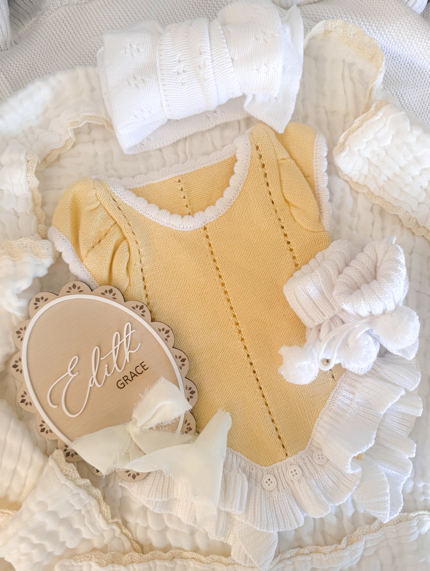 Yellow and white frill leg baby announcement outfit