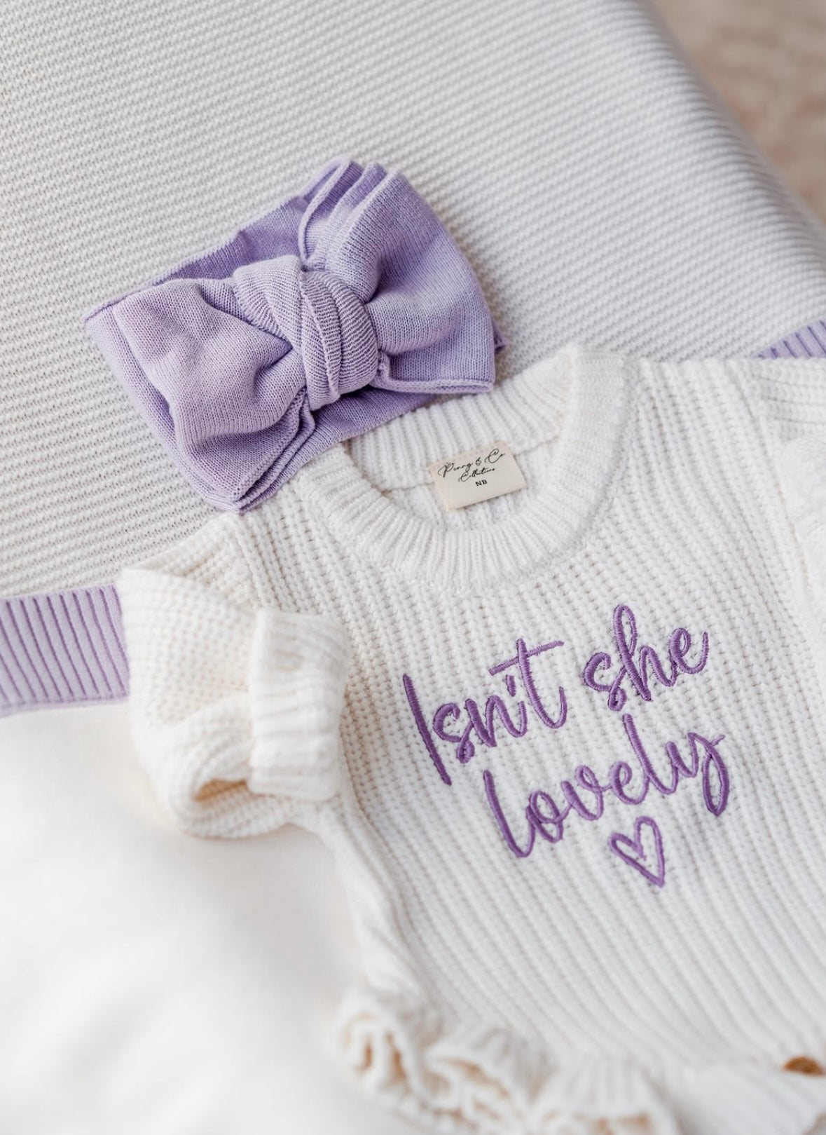 Isn’t she lovely lilac baby announcement romper
