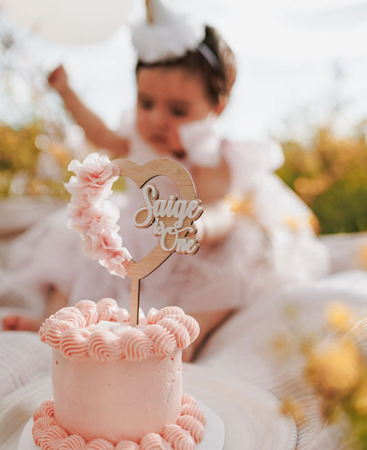 Dried floral heart cake topper