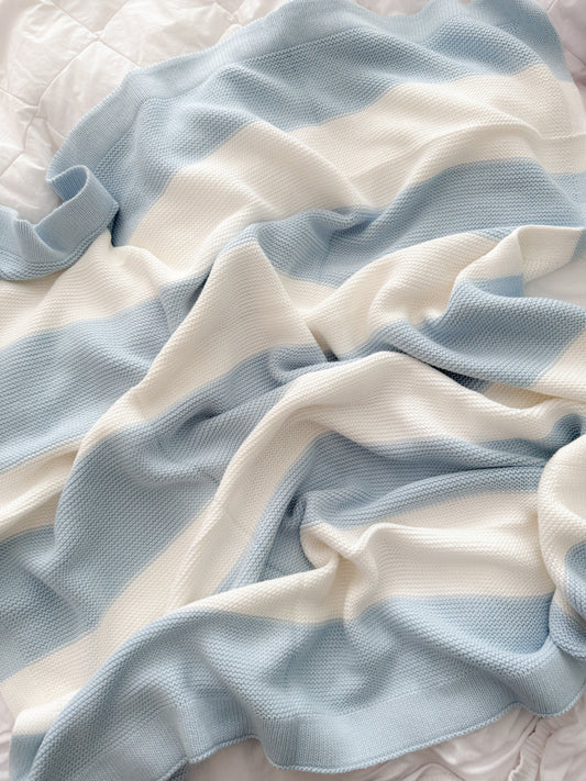 White and baby blue stripe knit blanket